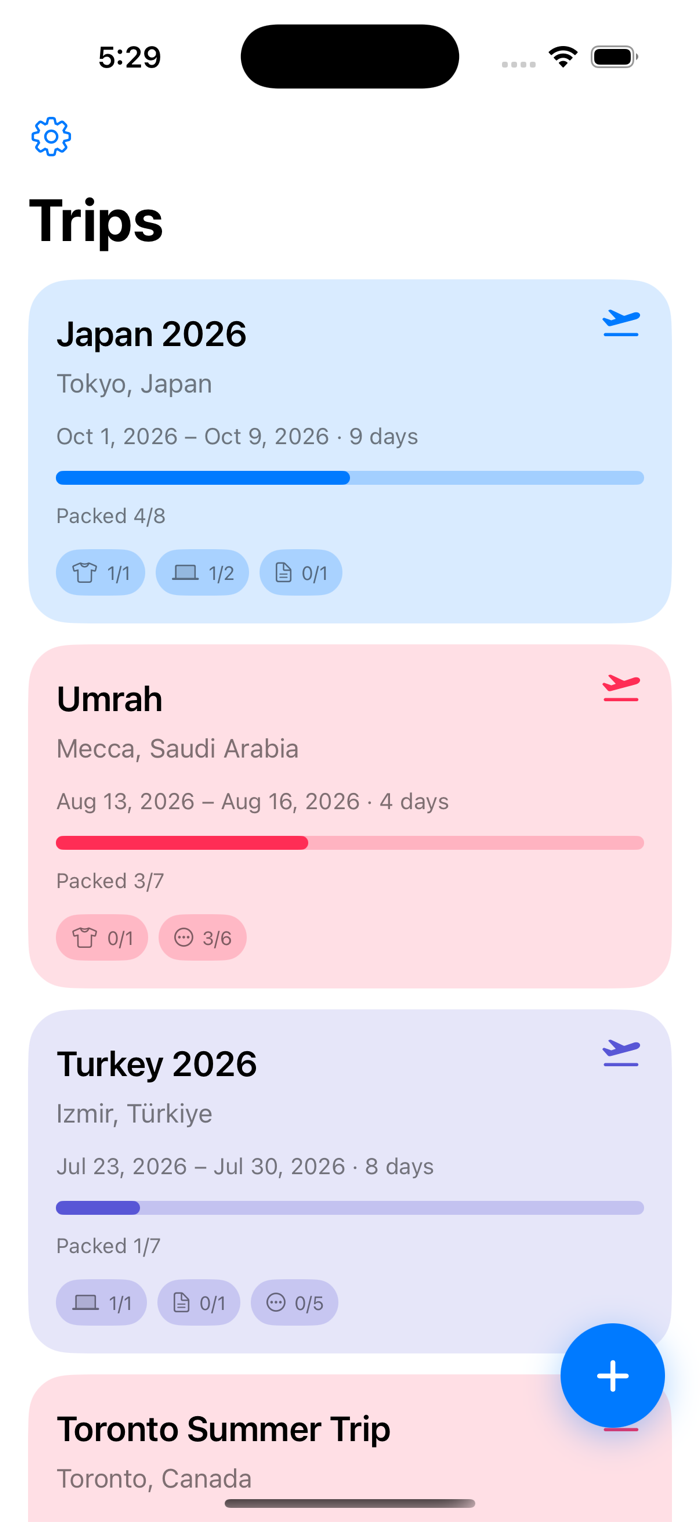 TravelTote Trips screen showing colourful trip cards for Japan, Umrah, and Turkey